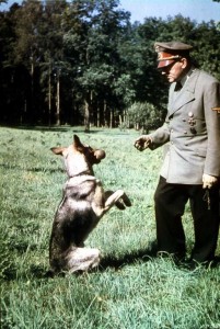 Adolf Hitler playing with his dog Blondi (1943). photo: Walter Frentz